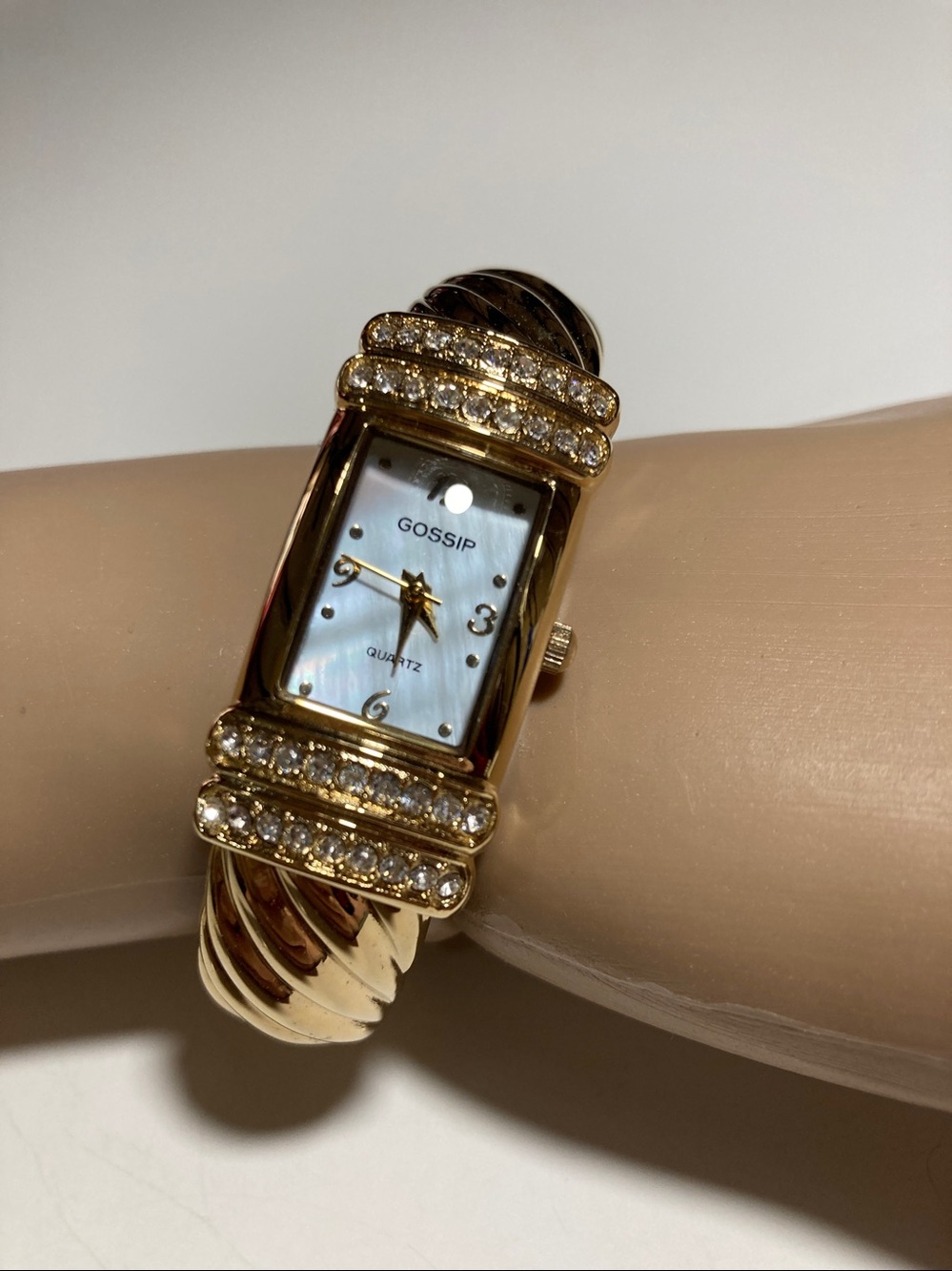 Gossip Goldtone Women’s Rectangular Bracelet Watch With Four Rows Of CZ Stones